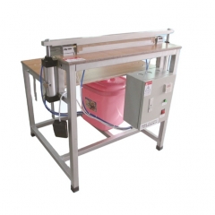 Diaper & Sanitary Napkin Sealing Machine